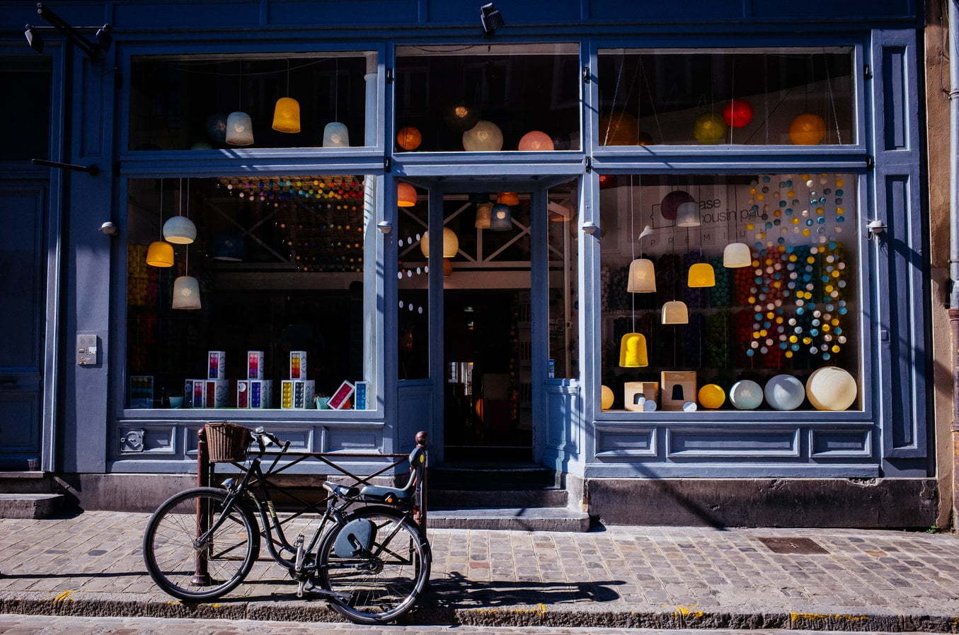 bicycle in front of small local business